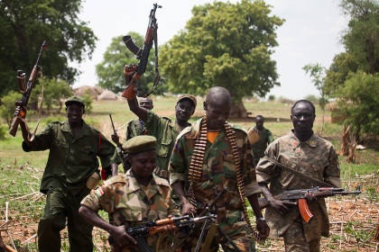 SPLA soldier near Dalami show off weapons they captured in a recent battle with SAF troops. The SPLA say they have surrouned Dalami and cut off all suplly lines except by helicopter. All civilians have fled the city.