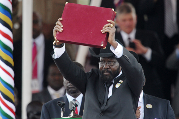 President of Southern Sudan Salva Kiir waves the newly signed constitution during the ceremony in the capital Juba on July 9, 2011 to celebrate South / Bieh Telegraph..